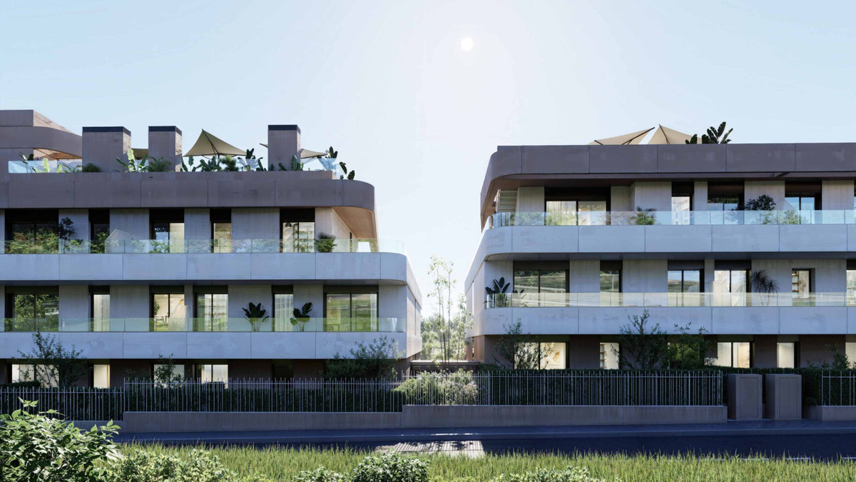 Eagle Hills – Estepona - modern residential exterior with curved balconies, rooftop terraces and lush landscaping