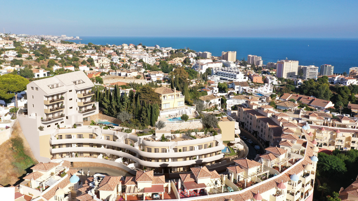 URBAN CITY HORIZON – Fuengirola - aerial view of luxury new-build development with curved facades, terraces, and Mediterranean sea views