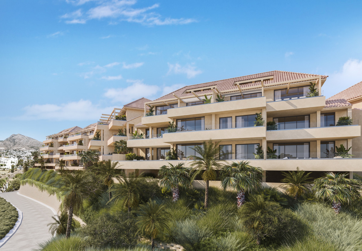 Abelias – Benalmadena - luxury new-build apartment complex exterior with tiered terraces, palm trees and terracotta rooftops on the Costa del Sol