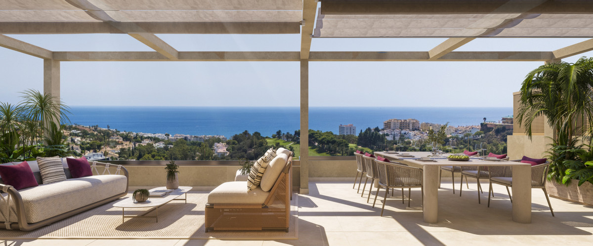 Abelias – Benalmadena - luxury terrace with outdoor lounge, dining area, pergola, and panoramic sea views over the Costa del Sol coastline