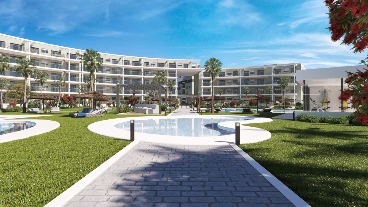 Amphora Beach Fase IV – Manilva - landscaped communal gardens, curved swimming pools and white residential facades