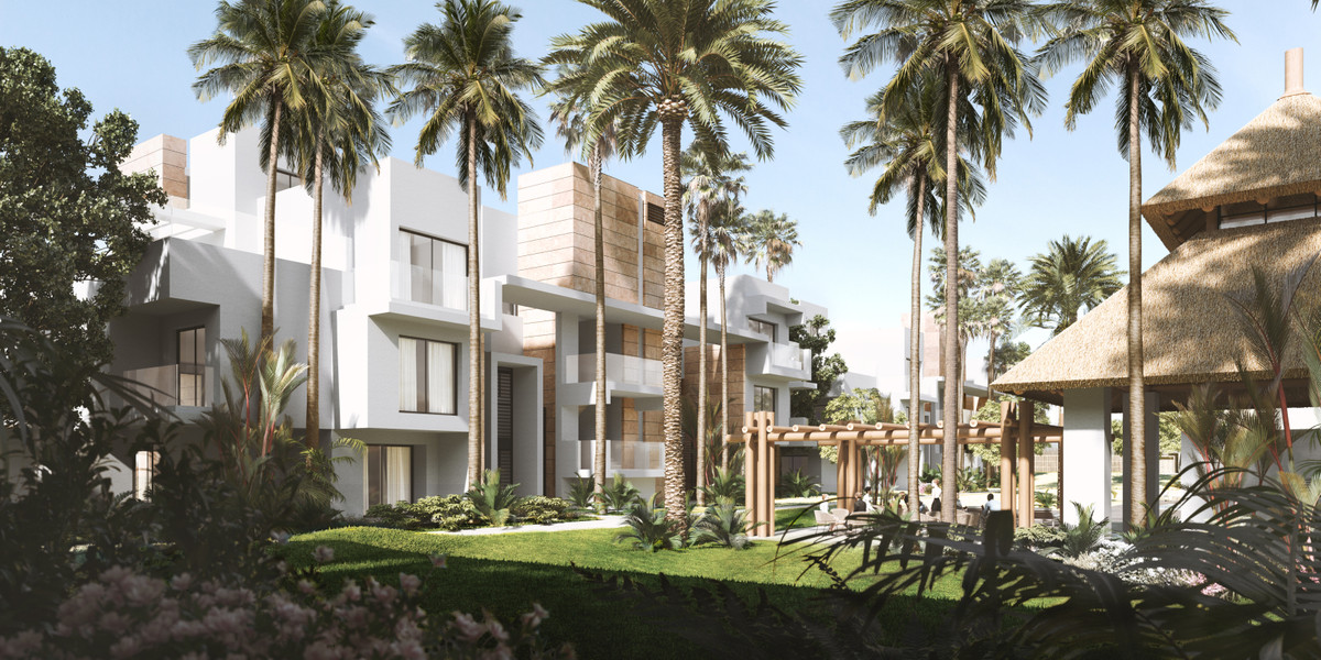 Ayana Estepona – New Golden Mile - modern white exterior facades surrounded by palm trees, lush gardens and thatched pavilion