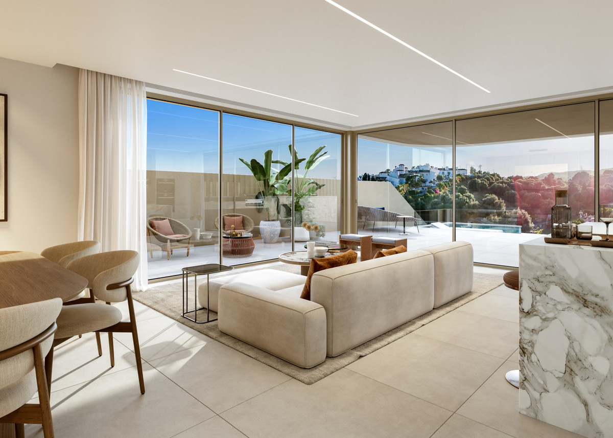 Beyond Homes – Estepona - bright open-plan living room with floor-to-ceiling glass and terrace views