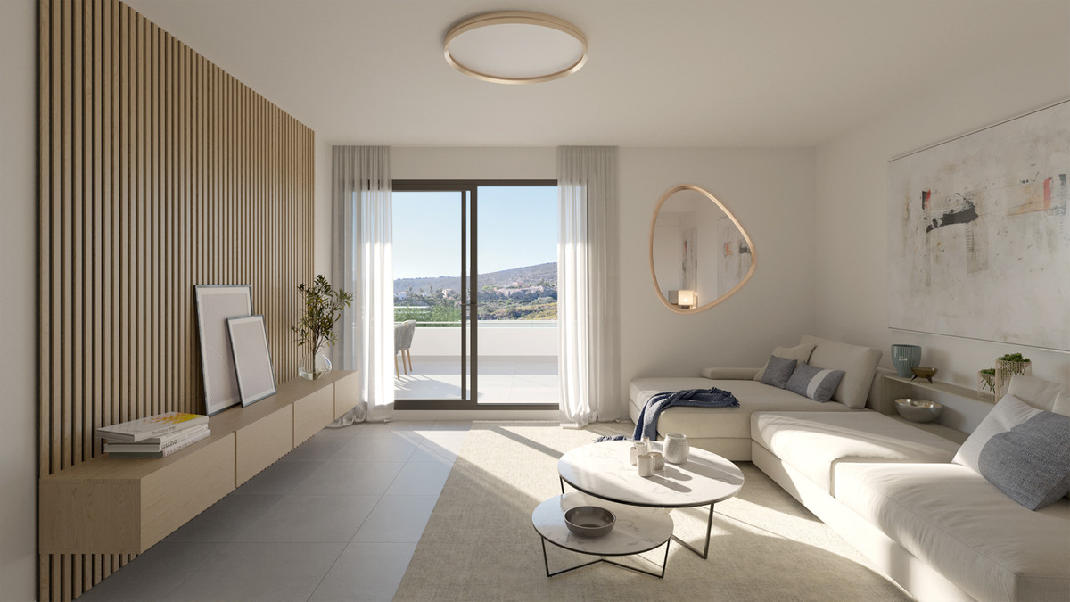 Blue View Heights – Manilva - bright modern living room with wood slat feature wall, sectional sofa, and balcony views to hills