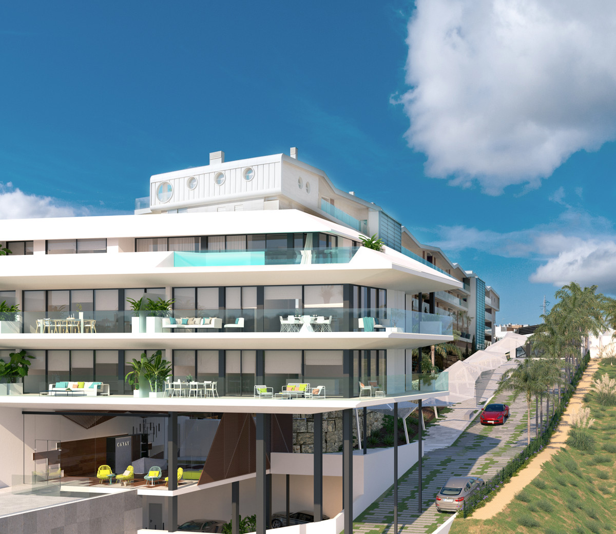 Carat – Carvajal - modern luxury apartment building exterior with glass balconies, rooftop pool and landscaped terraces on the Costa del Sol