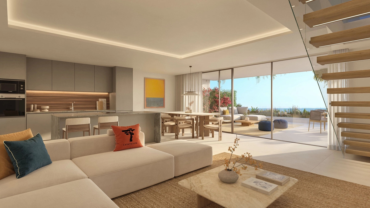 Casatalaya Residences – Benalmadena - open-plan living room with kitchen island, dining area, and sea-view terrace