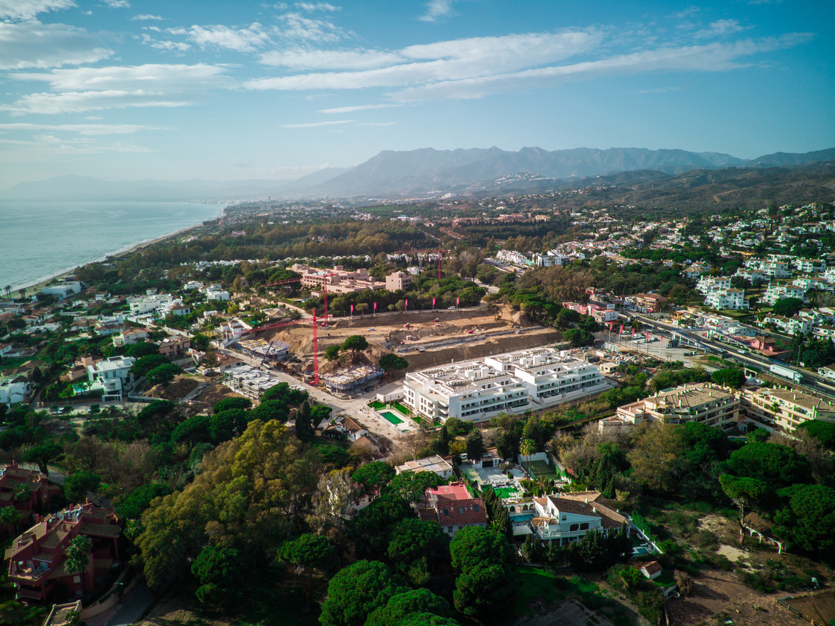 Estrella del Mar Villas Marbella – Marbella - aerial view of luxury new-build development with sea views and mountain backdrop