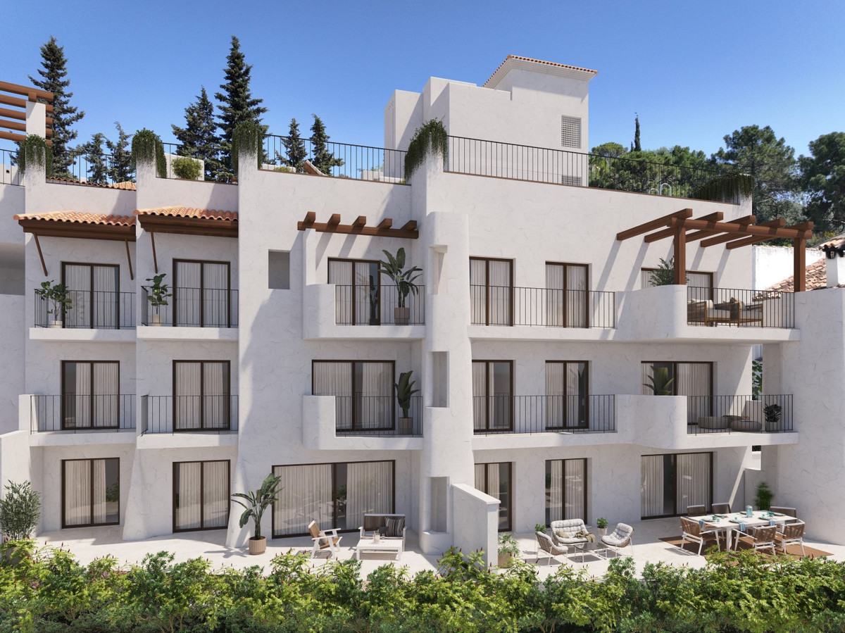 Fuente Lirios – Benahavís - white rendered exterior facade with balconies, wooden pergolas and landscaped garden terraces
