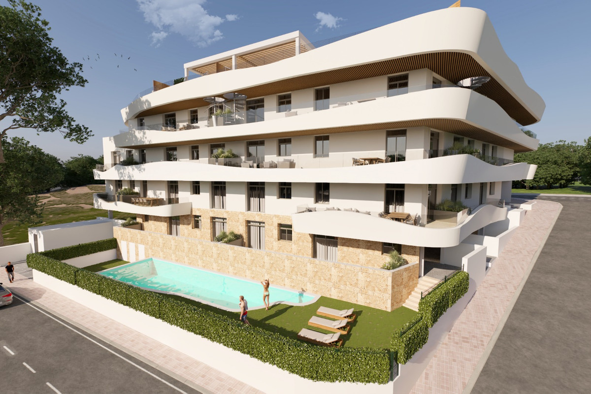 Green Mountain 1 – Estepona - modern white apartment building exterior with communal pool and landscaped garden