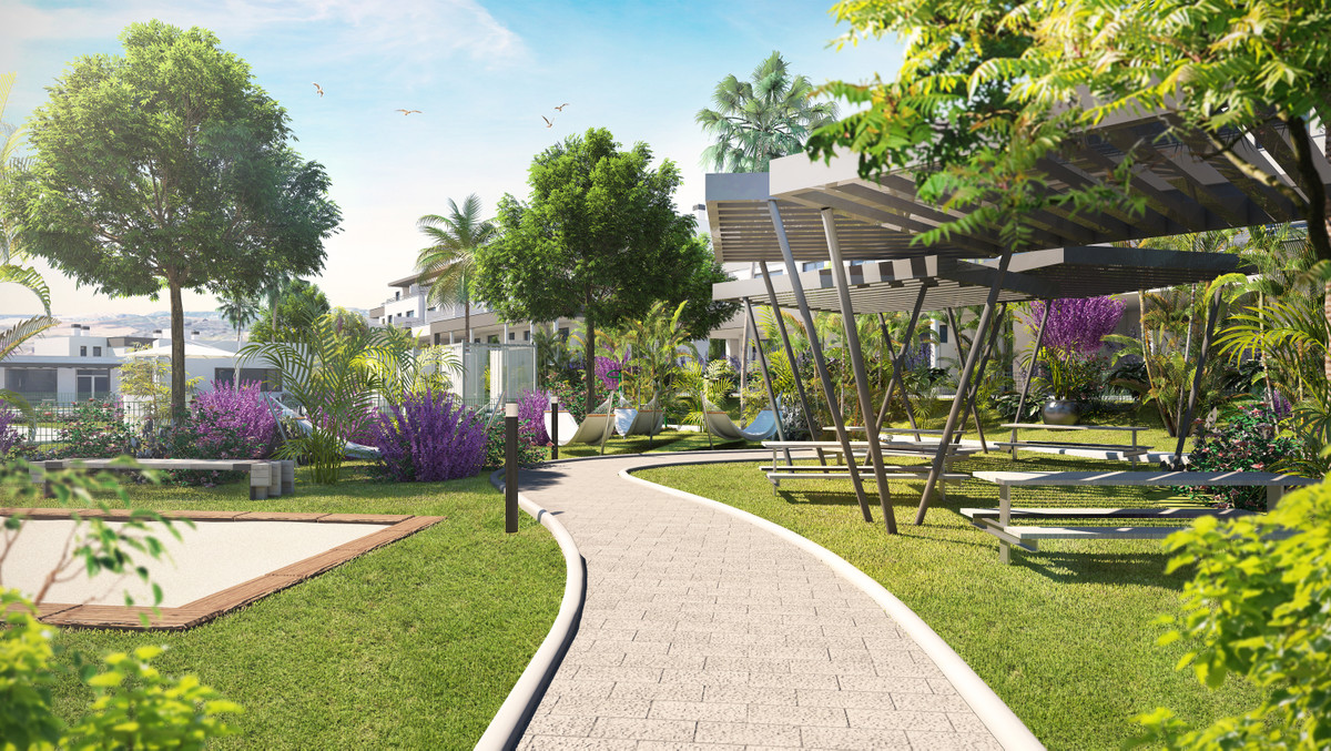 Habitat Valle Romano – Estepona - landscaped garden pathway with pergola, seating areas and purple flowering plants