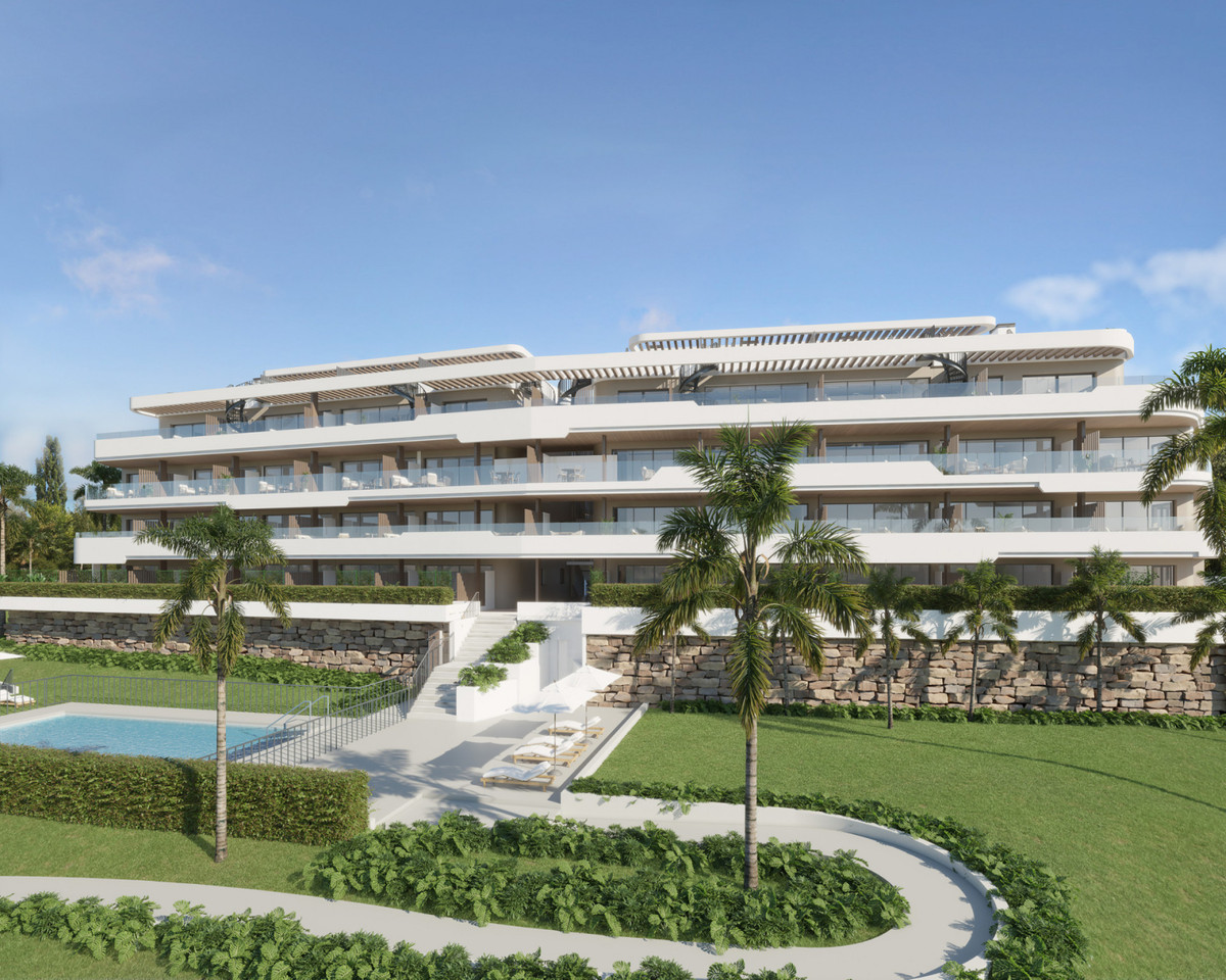 HORIZON VIEWS – Manilva - modern white residential facade with terraces, palm trees, pool and landscaped gardens
