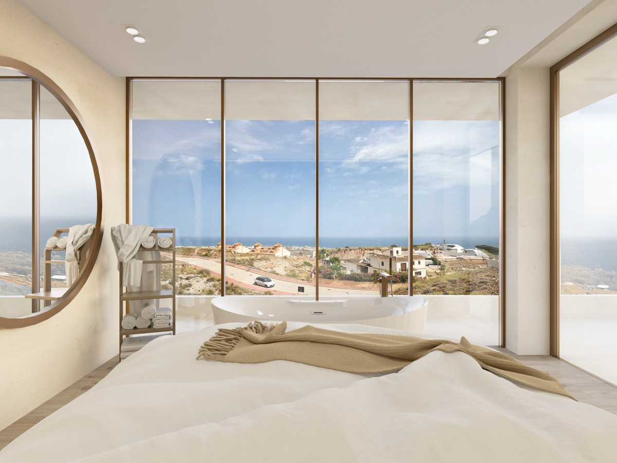 La Roca 2 – Benalmadena - luxury bedroom with freestanding bath and panoramic sea views through floor-to-ceiling windows