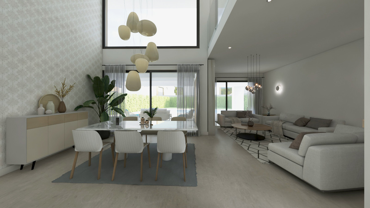 Los Hidalgos de La Duquesa – La Duquesa - open-plan dining and living area with high ceilings and large glazed doors leading to garden
