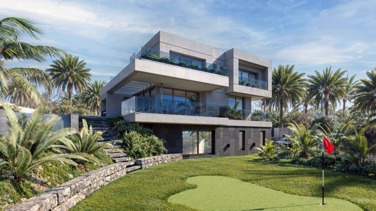 Luxury Golf – Mijas - modern three-storey concrete villa exterior with glass balconies, lush tropical gardens and private putting green