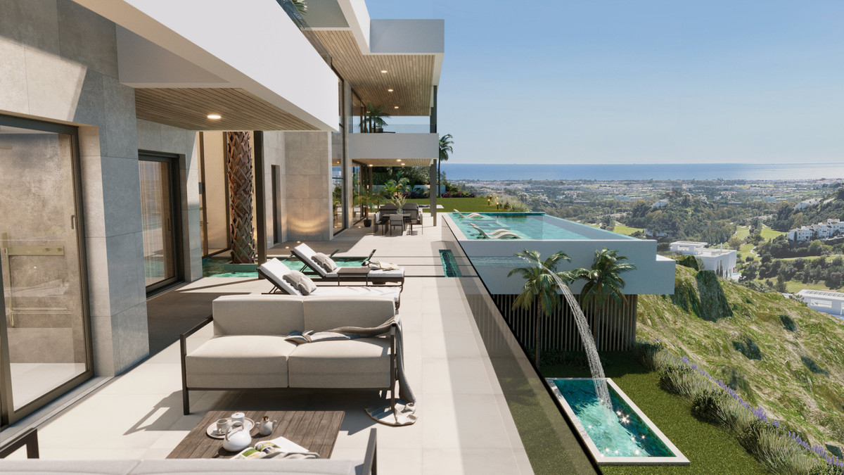 Madroñal View – Villa Hope – El Madroñal - luxury terrace with infinity pool, sun loungers and panoramic sea views over the Costa del Sol