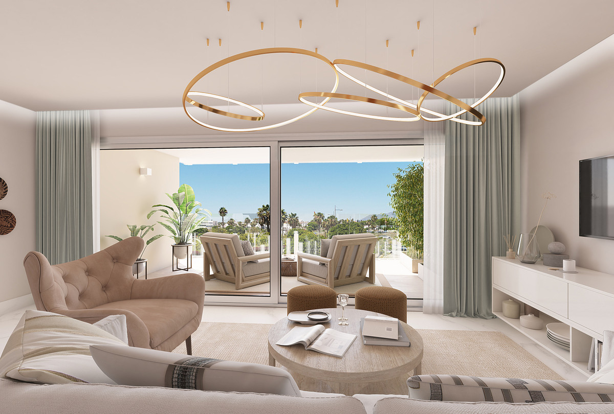 Mare – San Pedro de Alcántara - bright living room with gold sculptural chandelier and terrace sea views