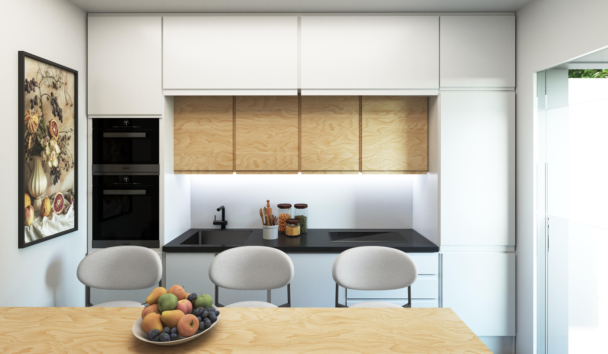 Mirador de las Arquillas – Antequera - modern white kitchen with wood cabinets, black countertops and double oven