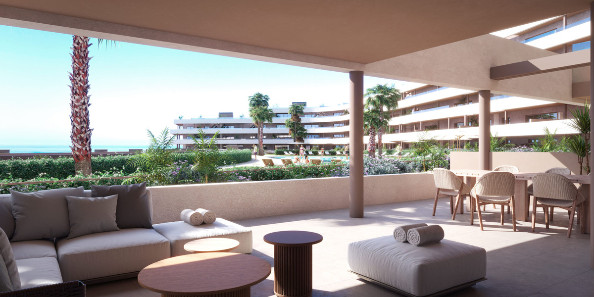 MORASOL – BUILIDING 1 – Manilva - shaded terrace with lounge seating, dining area, pool and sea views