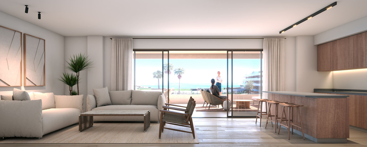 MORASOL – BUILIDING 1 – Manilva - open-plan living room with sea-view terrace and kitchen island