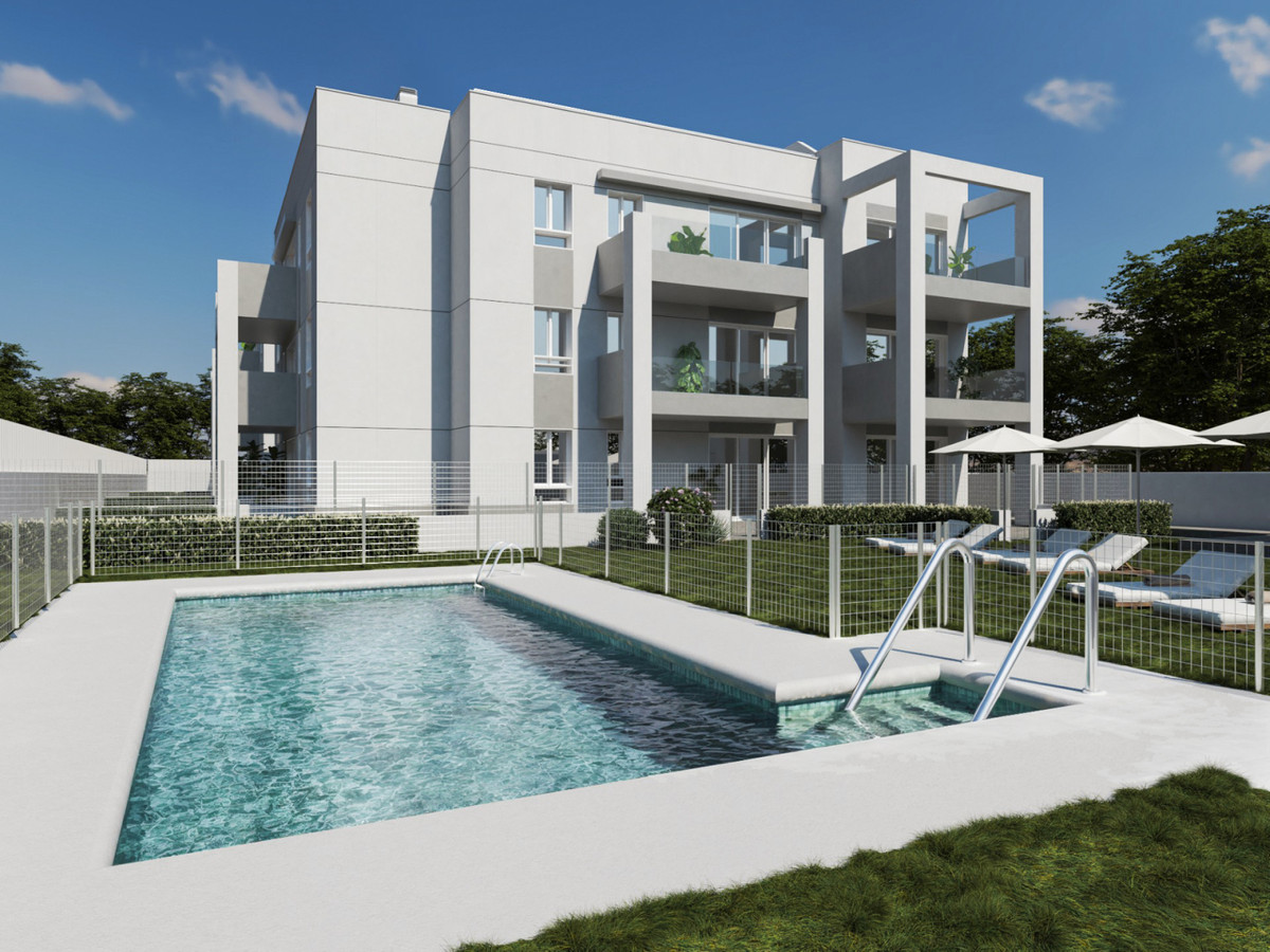 OCEANIC GARDEN – Mijas - modern white residential building with communal swimming pool and landscaped garden