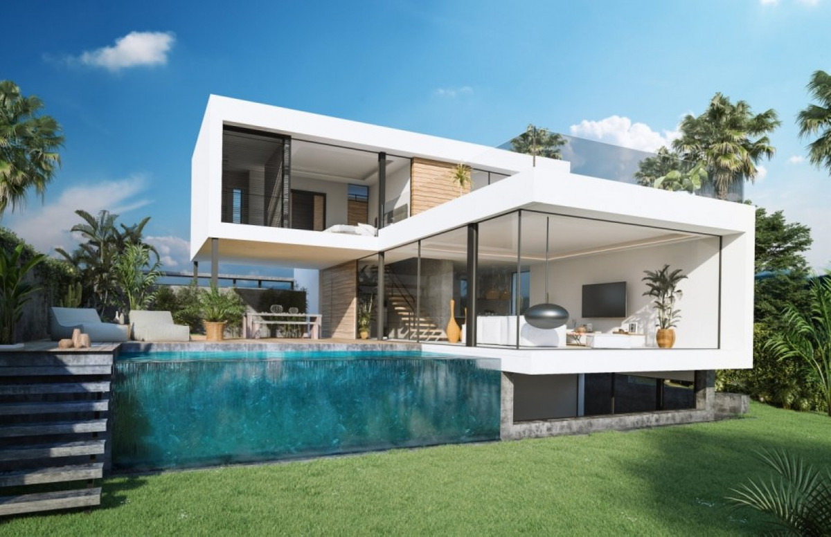 Sanctuary Villas II – El Paraiso - modern white two-storey villa with infinity pool, glass walls, and tropical garden
