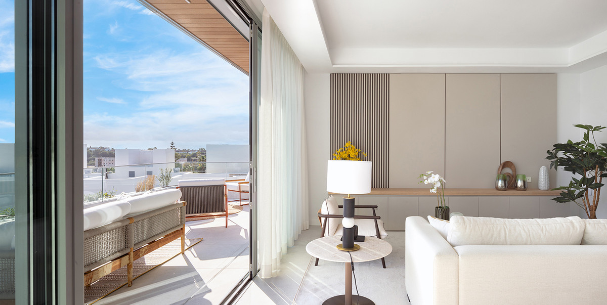 Santa Clara Homes – Marbella - bright modern living room with open terrace, sheer curtains and panoramic city views