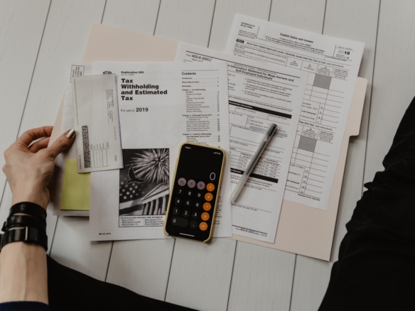 Non-resident buyer reviewing Spanish mortgage paperwork for a new build property on the Costa del Sol
