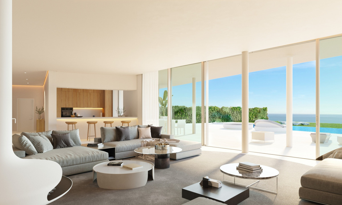 The Bay 7 – Benalmadena - open-plan living room with floor-to-ceiling glass doors, sea views, pool terrace and integrated kitchen