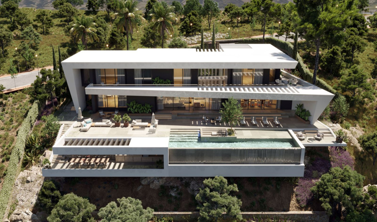 Villa Akasia – Benahavís - aerial view of modern luxury villa with infinity pool, terraces and mountain backdrop