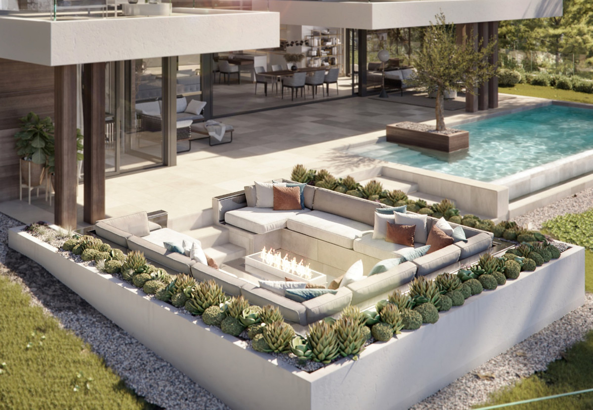 VILLA AZAHAR San Roque Club – San Roque Club - sunken outdoor lounge with fire pit, pool, and succulent garden