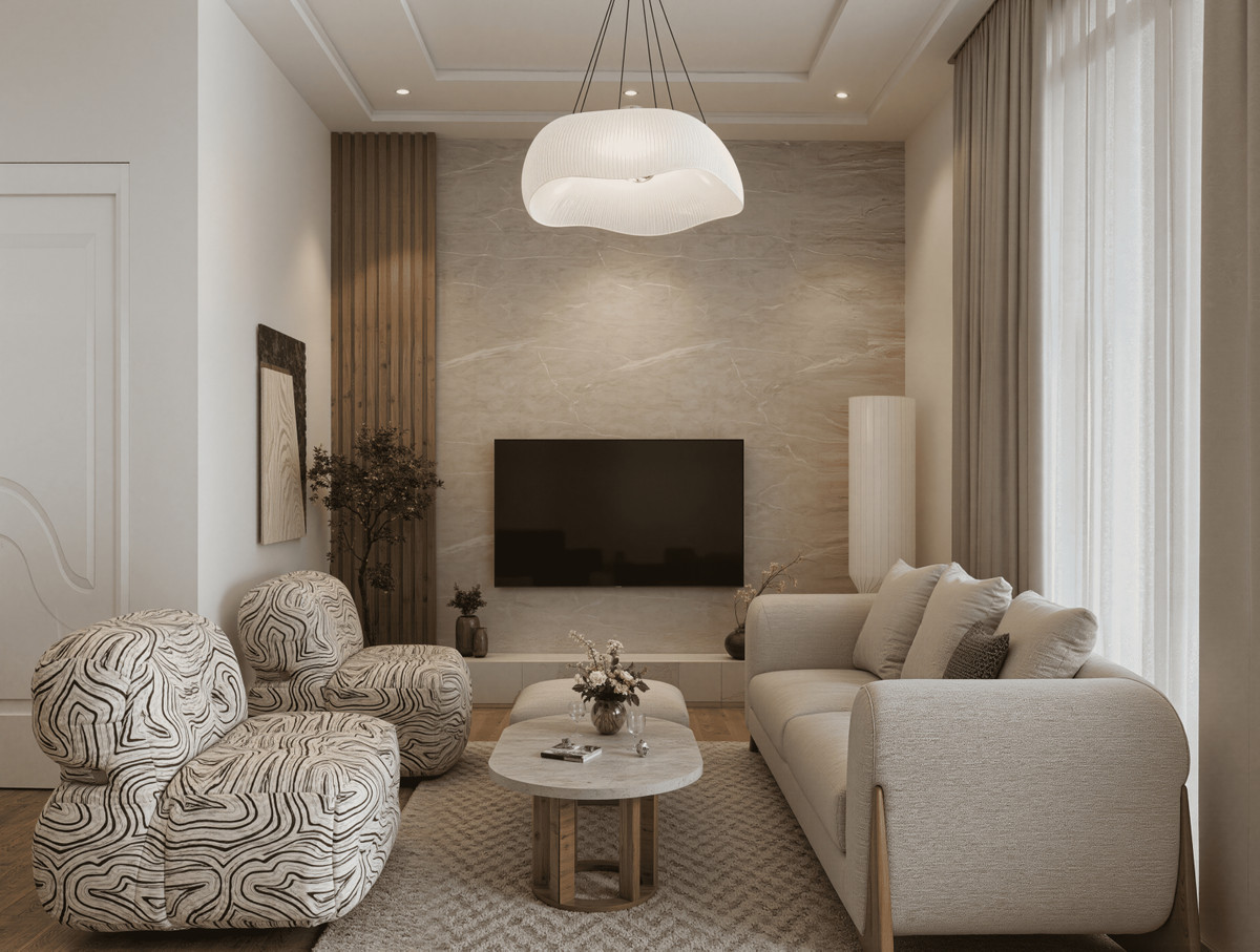Villa Colombia – Casares - luxury living room with marble feature wall, patterned armchair and pendant light