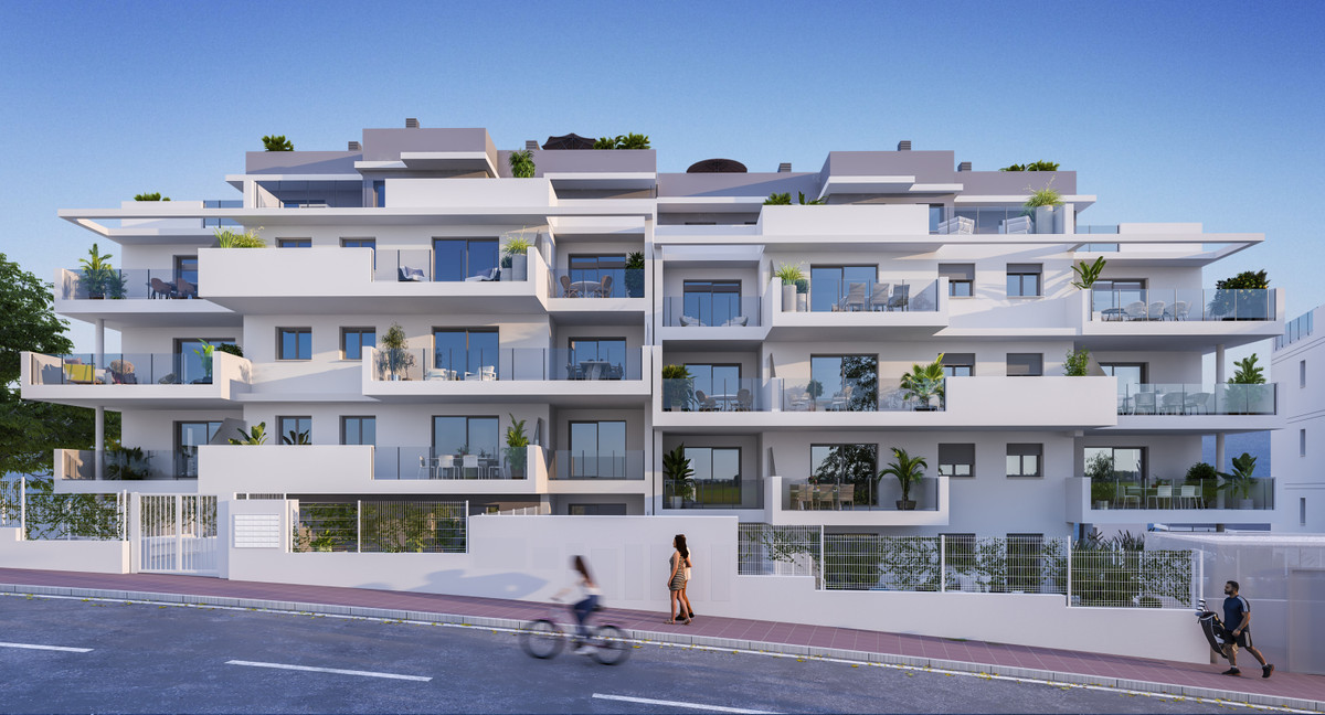 Alonia II – Manilva - modern white-render luxury apartment building exterior with tiered balconies and rooftop terraces