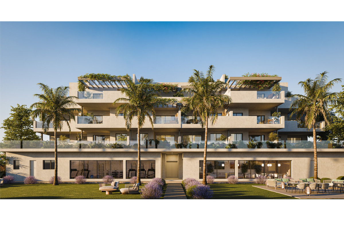 Alura Living – Casares - luxury residential facade with palm trees, green terraces, and landscaped garden