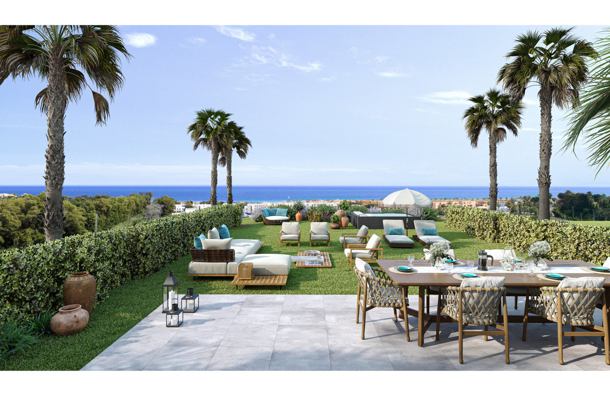 Alura Living – Casares - luxury terrace and garden with sea views, palm trees, and outdoor dining area
