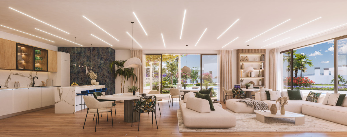 Amaranta Living – Casares - open-plan living, dining and kitchen area with marble island, built-in shelving and garden views