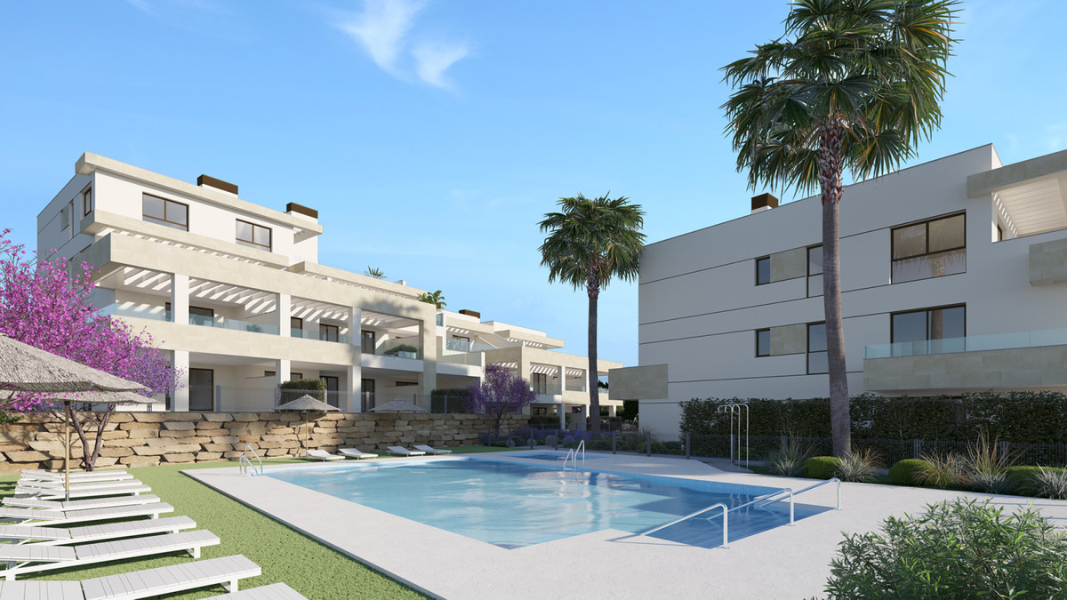 Bayside Homes – Estepona - luxury new-build apartments with communal pool, sun terrace, palm trees and landscaped gardens