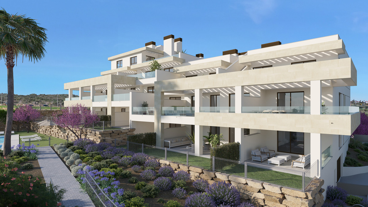 Bayside Homes – Estepona - modern luxury apartment complex exterior with terraces, landscaped gardens and lavender borders