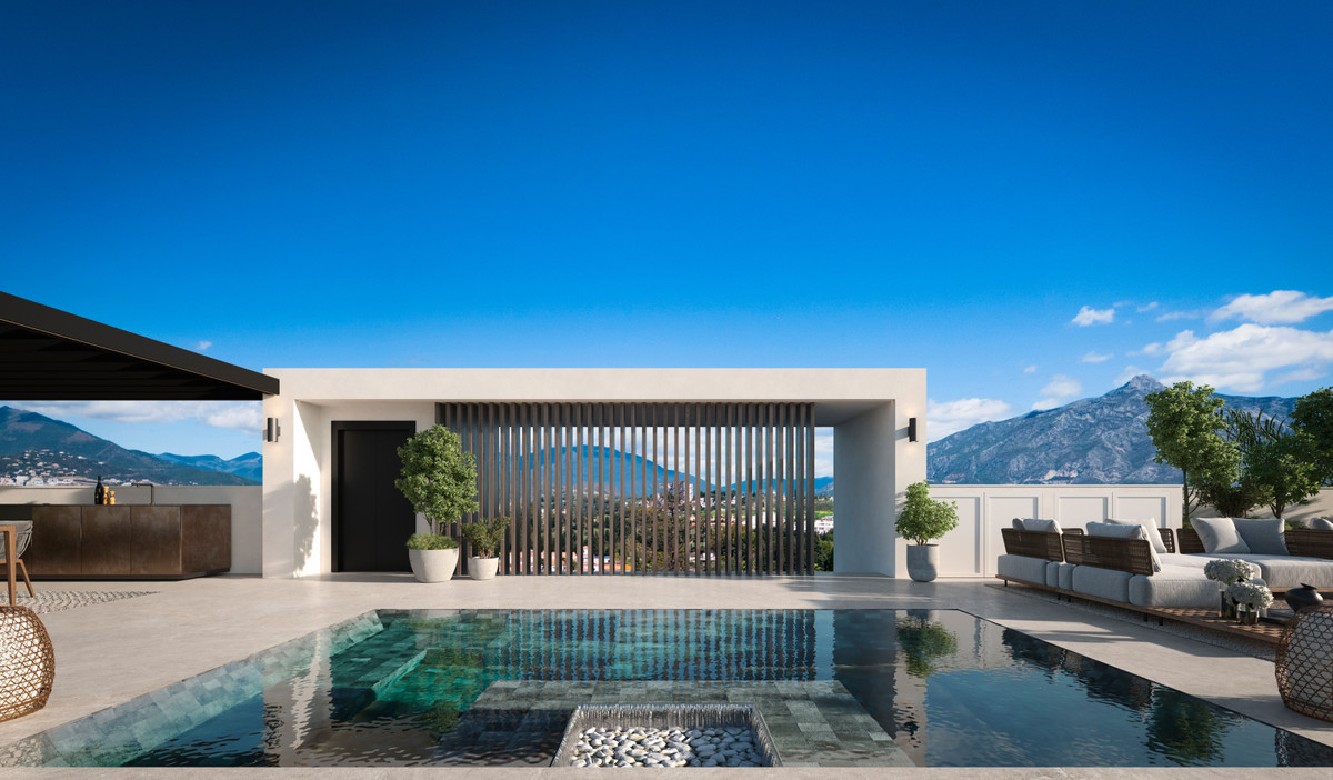Blume – Marbella - rooftop pool terrace with mountain views and modern lounge area