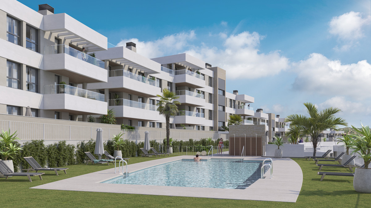 Insur Scala – Estepona - modern apartment complex with communal pool, sun loungers, palm trees and landscaped gardens