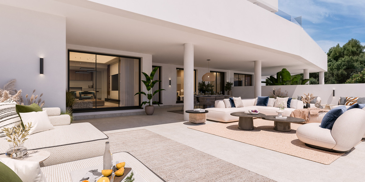 Medblue IV – Altos de los Monteros - spacious covered terrace with luxury outdoor seating and large sliding glass doors opening to interior living area