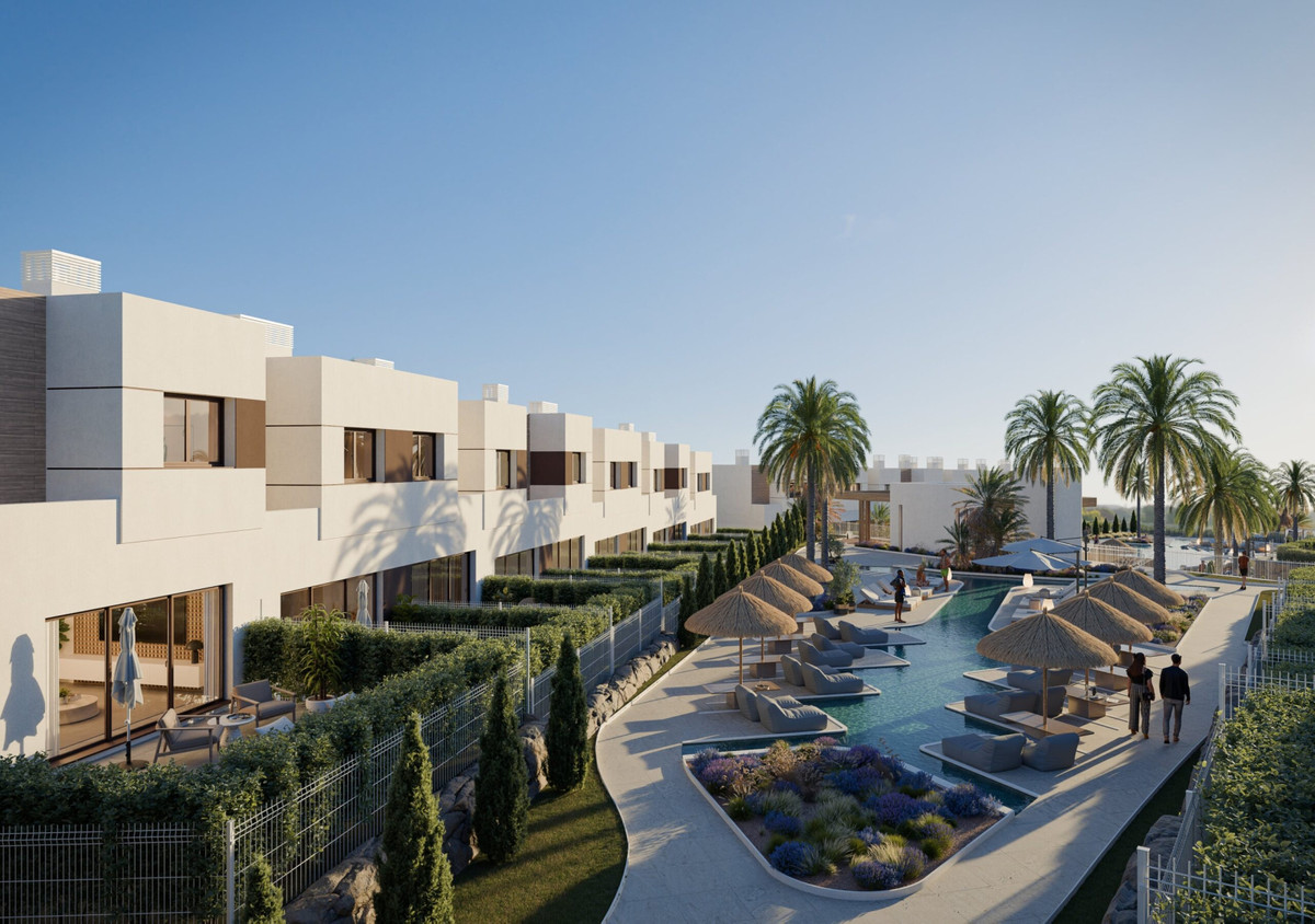 Savia – Fase 1 – Mijas - luxury new-build townhouses with communal pool, thatched parasols, and landscaped gardens on the Costa del Sol