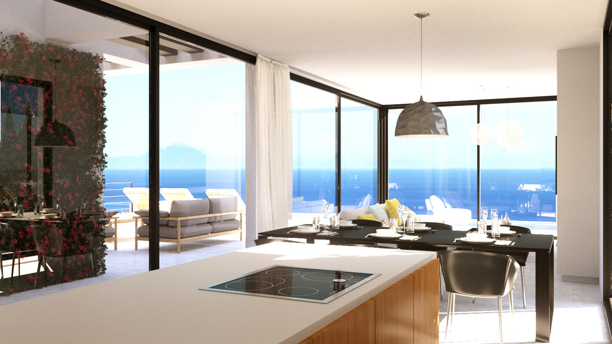 Stupa – Villa Shanti – Mijas Golf - open-plan kitchen and dining area with panoramic sea views through floor-to-ceiling glass