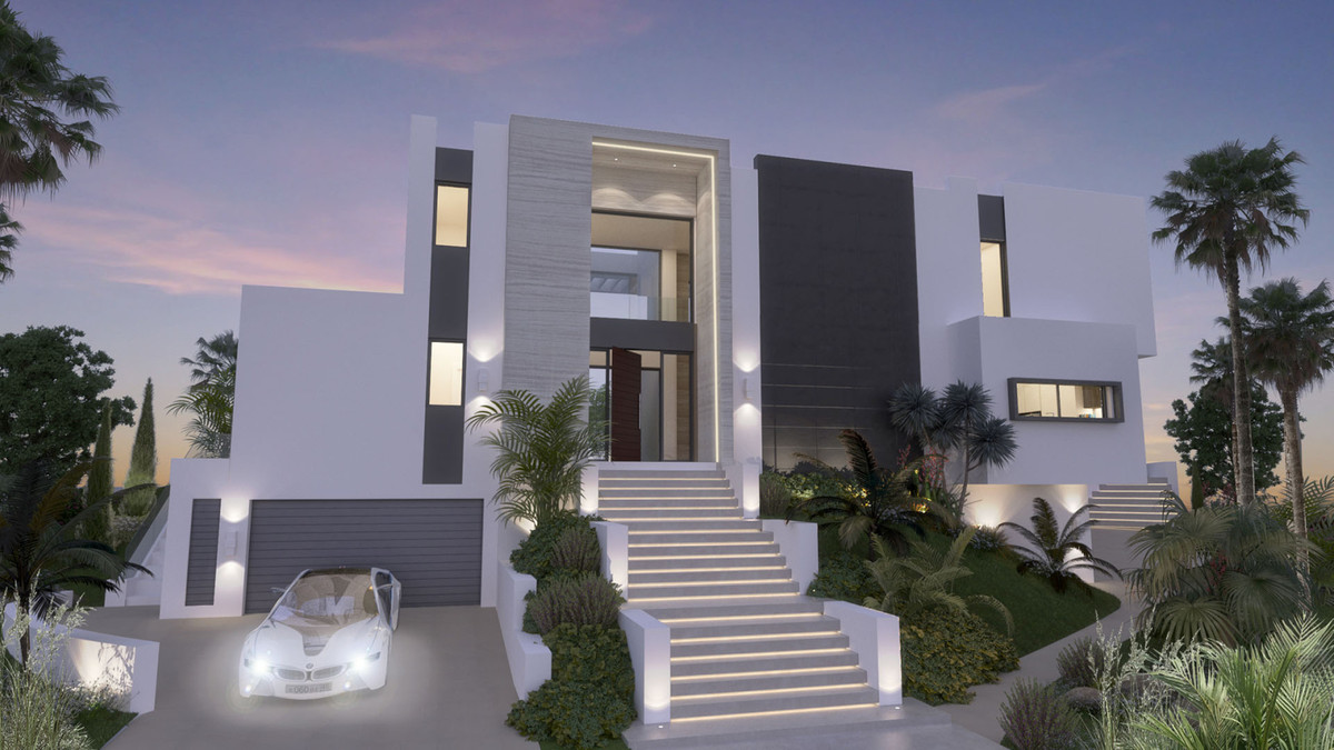 Villa Armonía – La Cala Golf - modern luxury villa exterior facade at dusk with illuminated staircase and white BMW convertible in garage