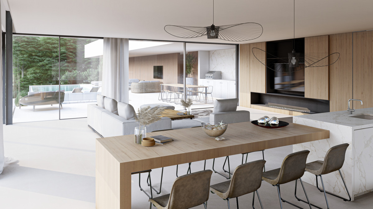 Villa E20 – Benahavís - open-plan kitchen, dining and living area with floor-to-ceiling glass doors and natural wood finishes