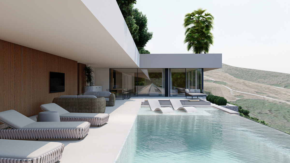 Villa E20 – Benahavís - infinity pool terrace with sun loungers and panoramic hillside views