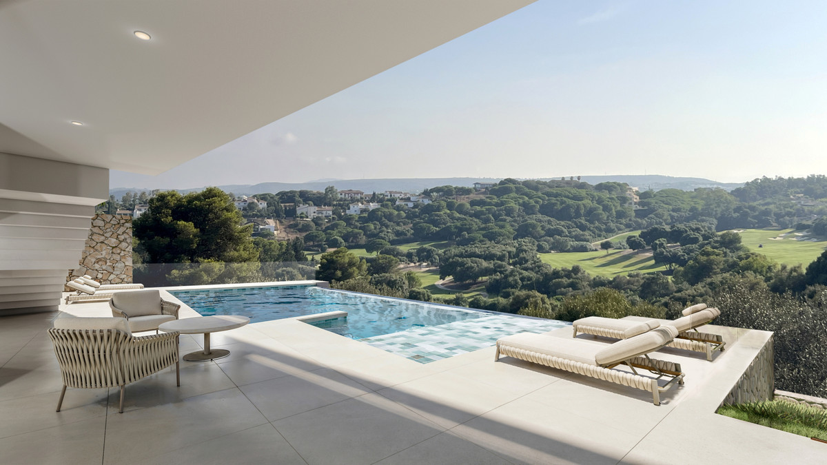 VILLA EVANIA de La Reserva – San Roque - infinity pool terrace with panoramic golf course and forest views