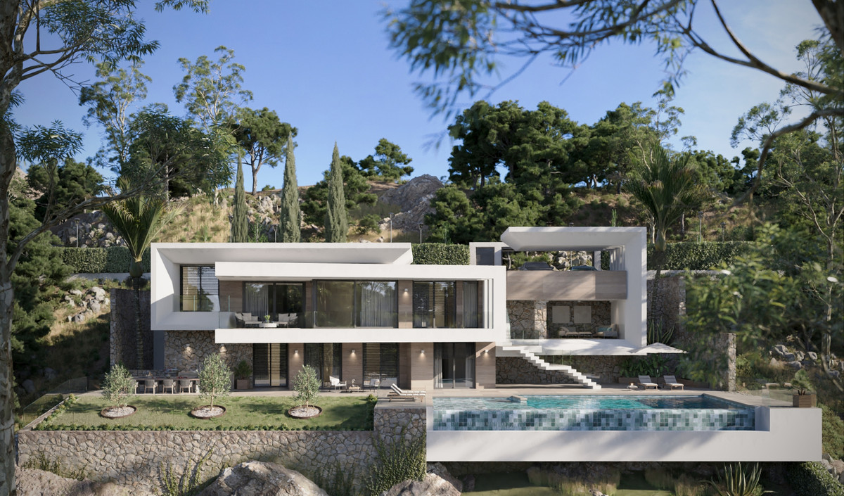 VILLA EVANIA de La Reserva – San Roque - modern luxury villa exterior with infinity pool, terraced garden and hillside backdrop
