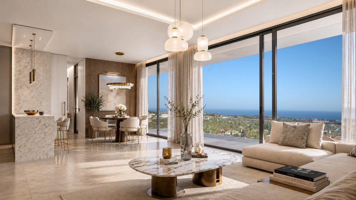 VILLA EVANIA Los Flamingos – Benahavís - open-plan living room with marble coffee table and panoramic sea views through floor-to-ceiling glazing