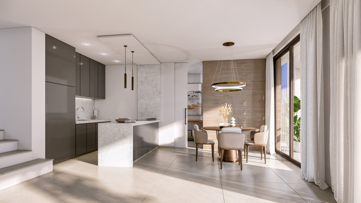 VILLA EVANIA Selwo – Estepona - open-plan kitchen and dining area with marble island and gold ring pendant light
