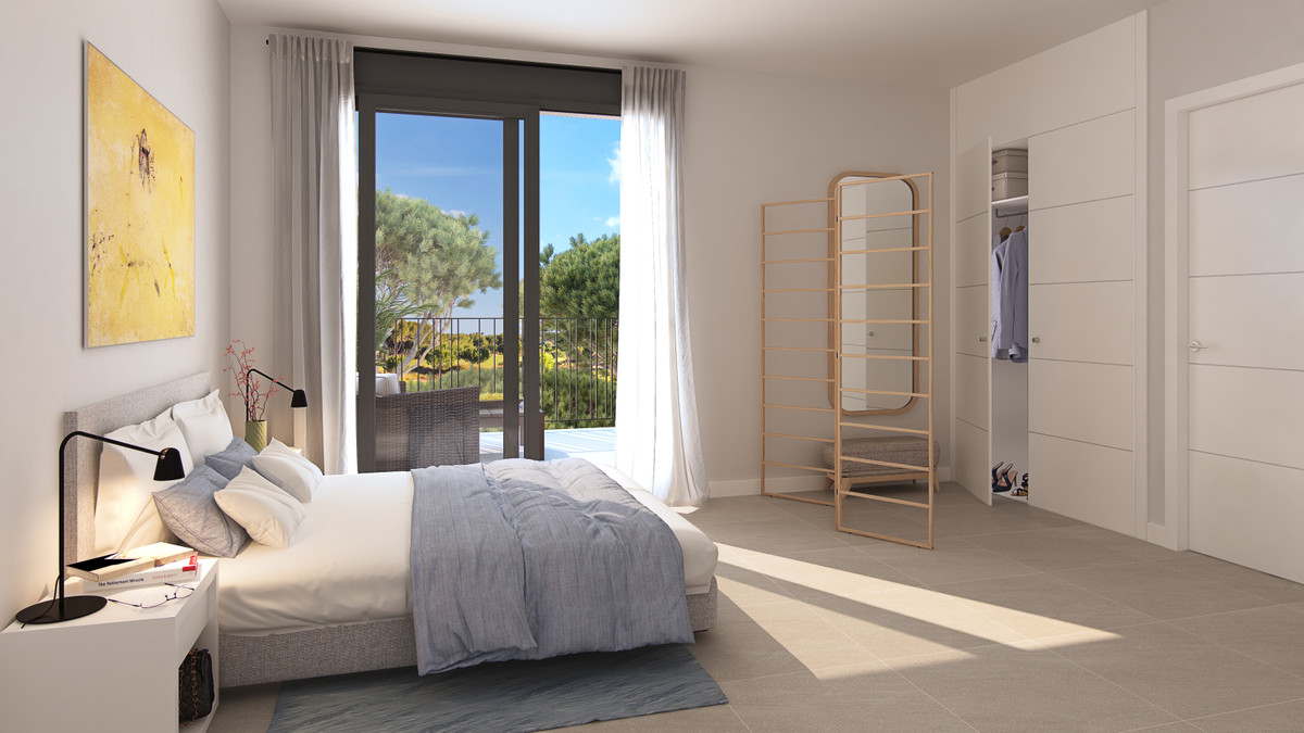 Adel San Roque – San Roque - bright master bedroom with balcony doors, open wardrobe and garden views
